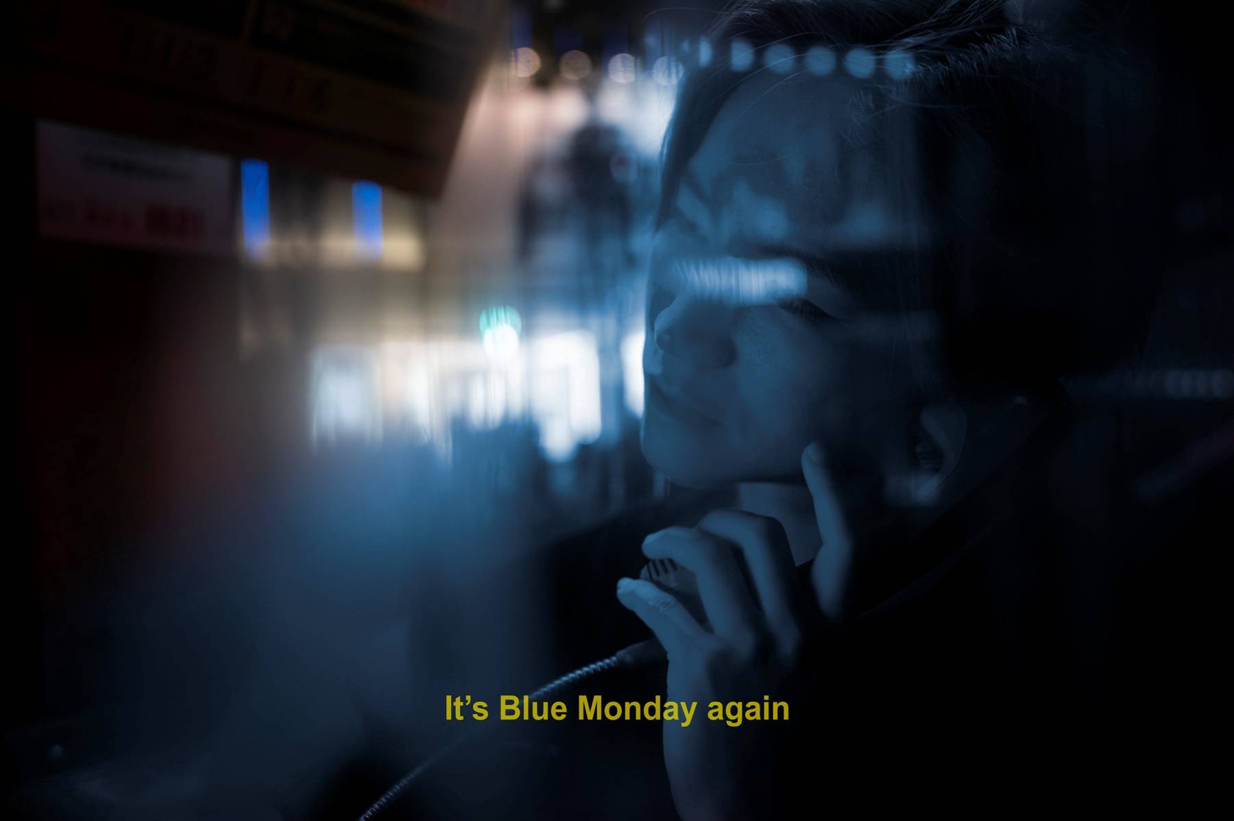 Blue tinted movie with yellow subtitle.